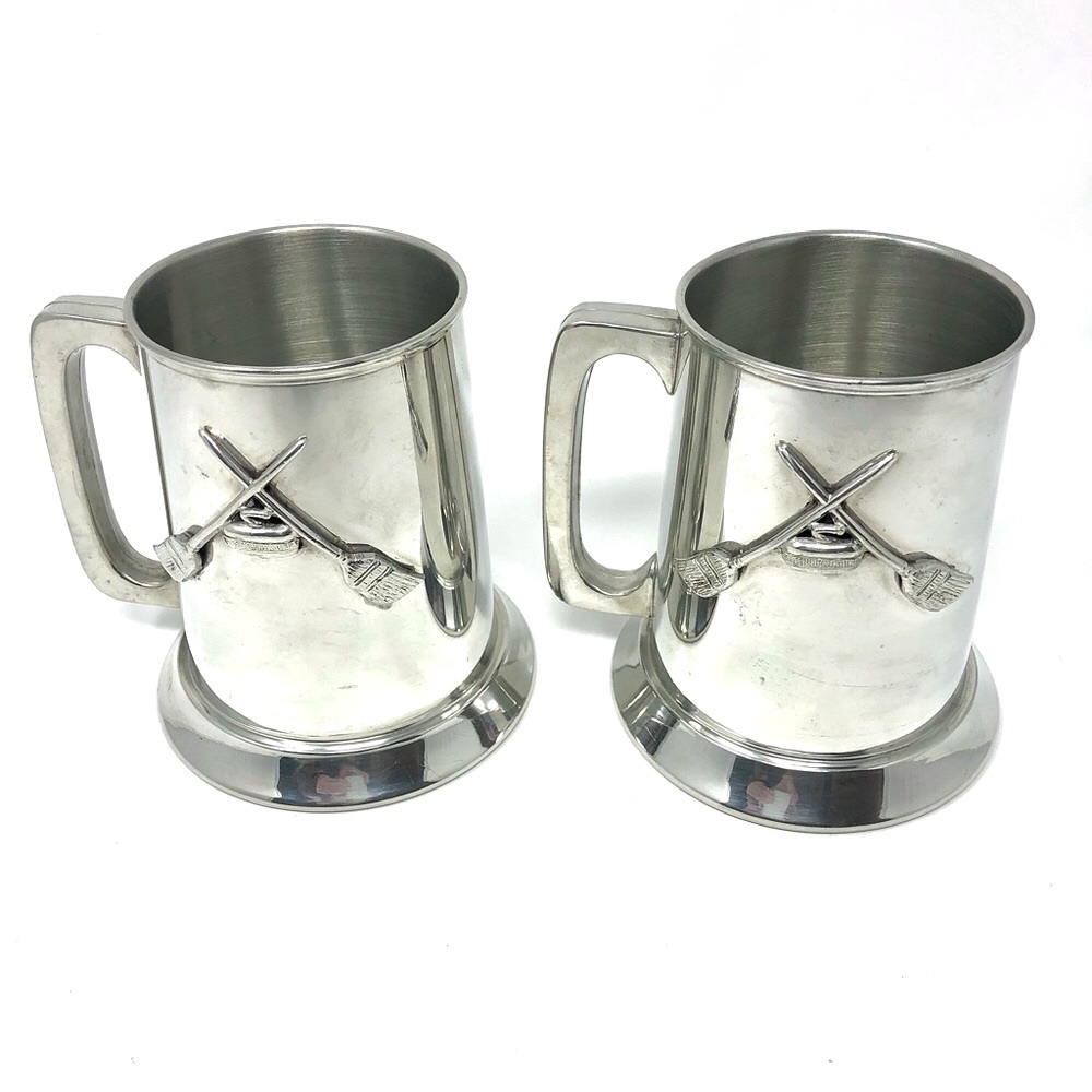 Vintage pewter curling themed barware steins